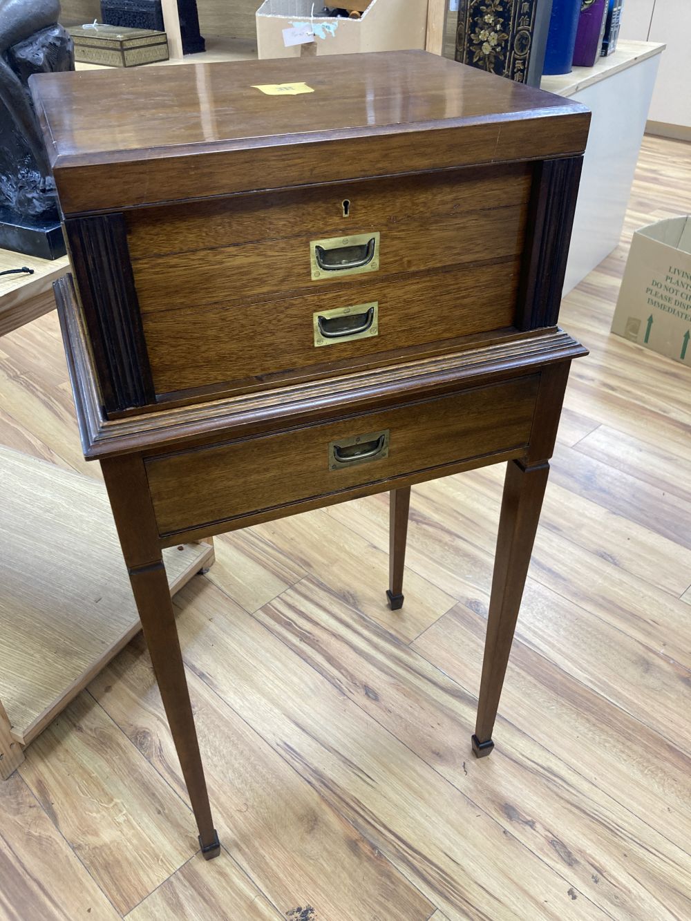 An early 20th century canteen, on stand, with single-lined drawers, lacks contents, width 52cm